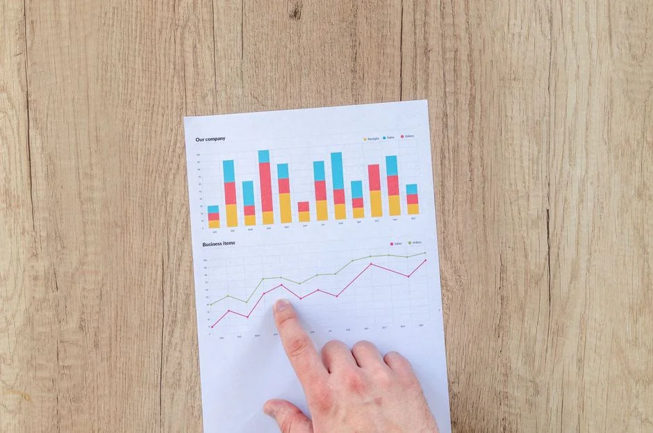 Man analyzing marketing content strategies using sticky notes on a whiteboard.